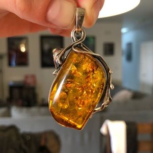 Sterling silver and amber pendant.